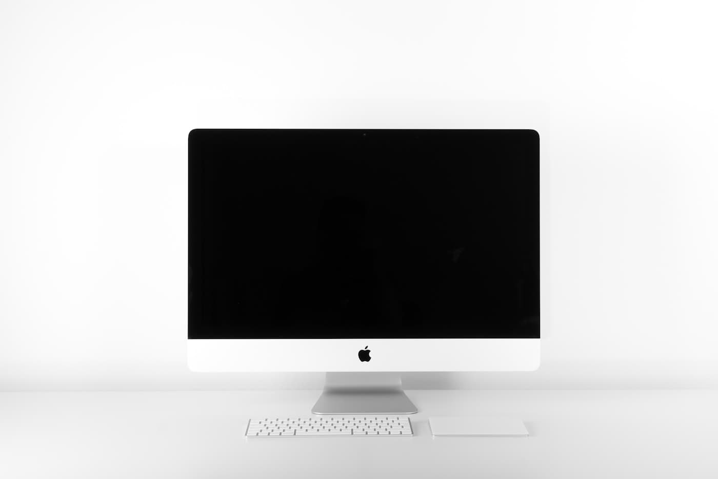 Home office workstation set up for an extended seated workday with dual monitors
